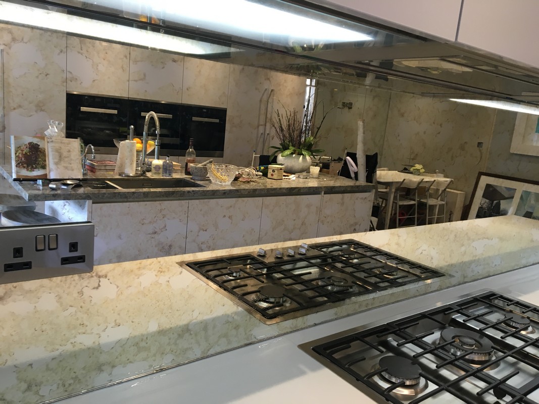 Mirror glass splashback in Northolt luxury kitchen
